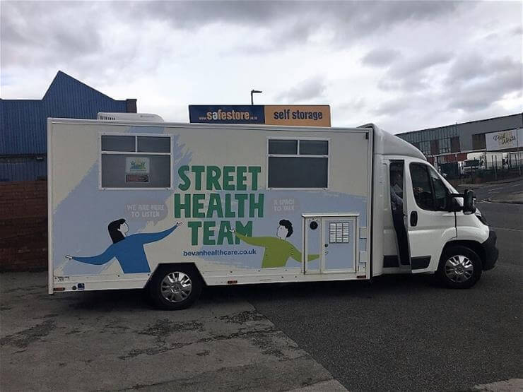 Large Van graphics mobile clinic